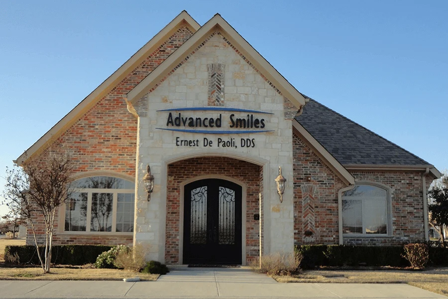 The Advanced Smiles office sign in Frisco, TX